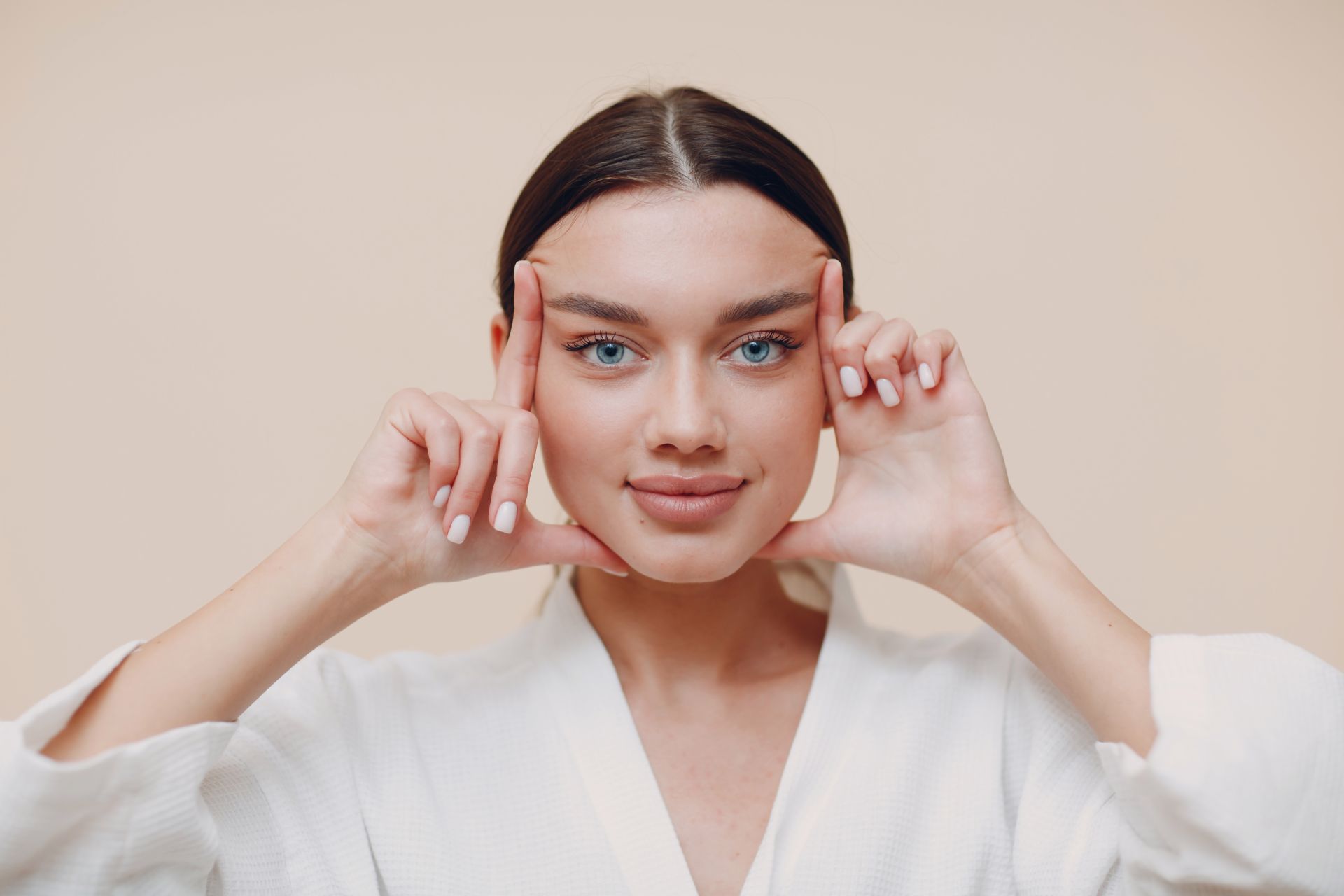 Young woman doing face building facial gymnastics self massage